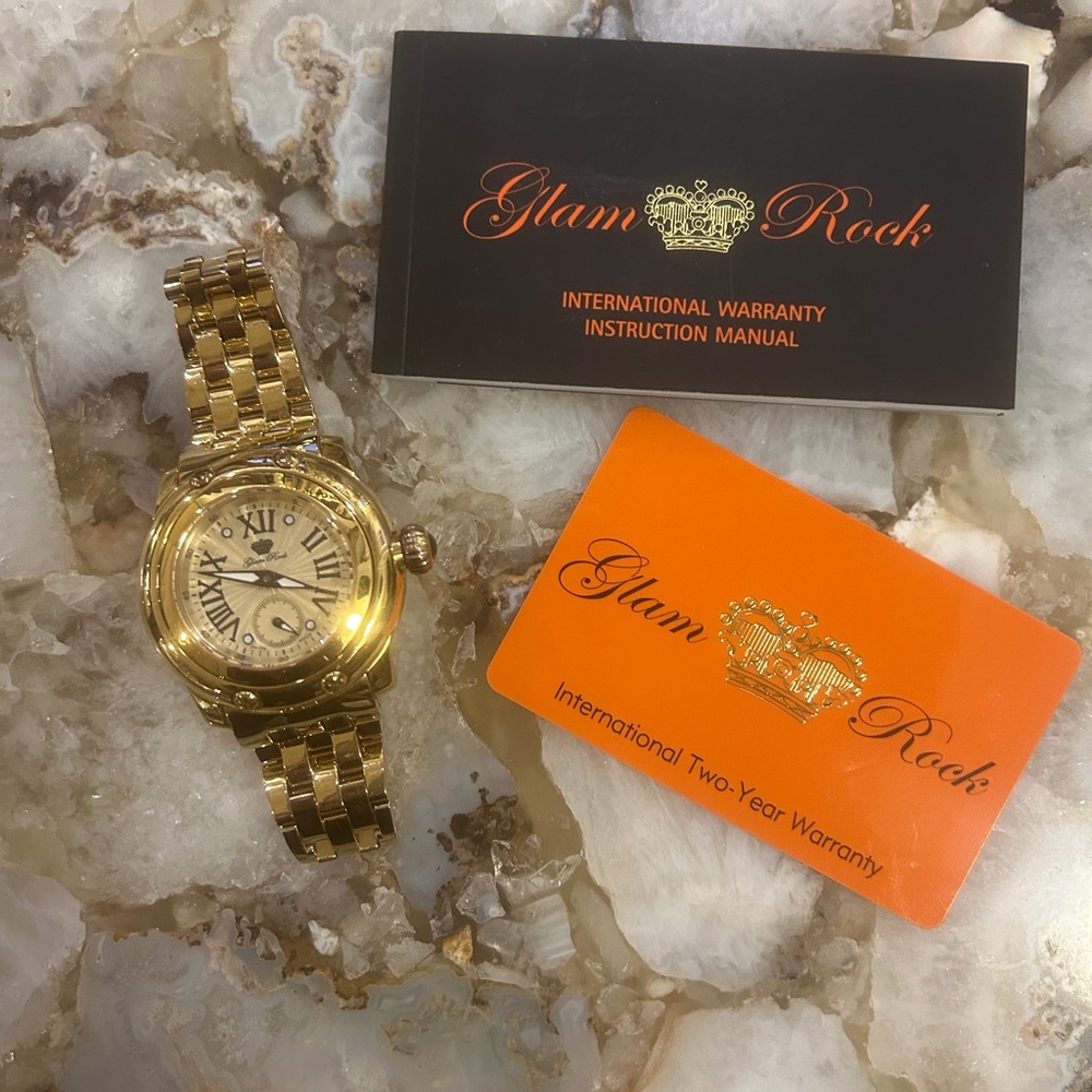 Stunning Glam Rock Ladies Gold Watch.
Excellent condition, no scratches!